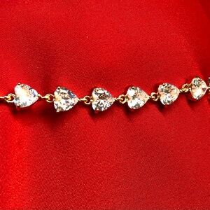 Elegant clear cubic zirconia heart tennis bracelet.14K gold plated.8” long.NWOT